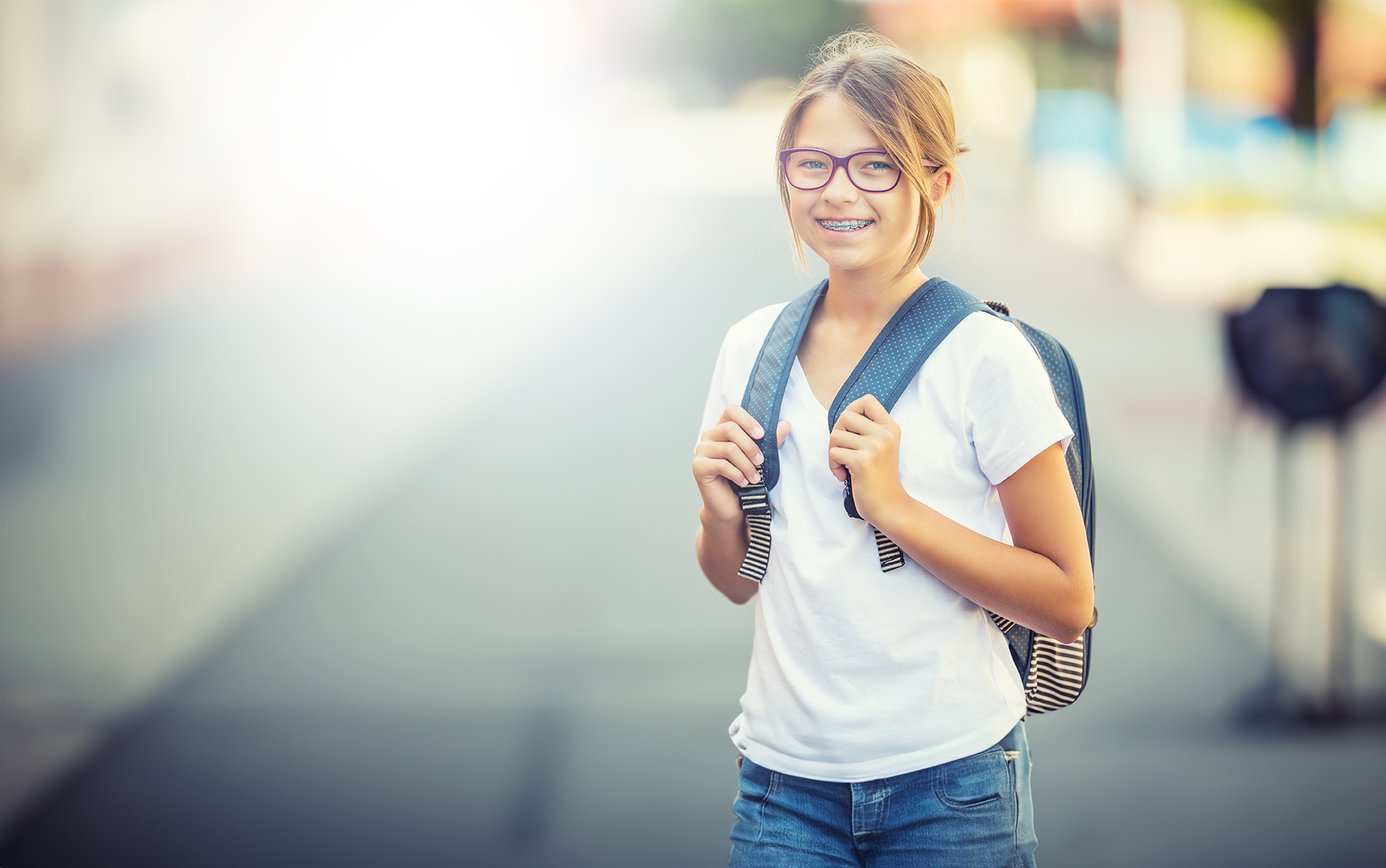 Young girl smiling with braces