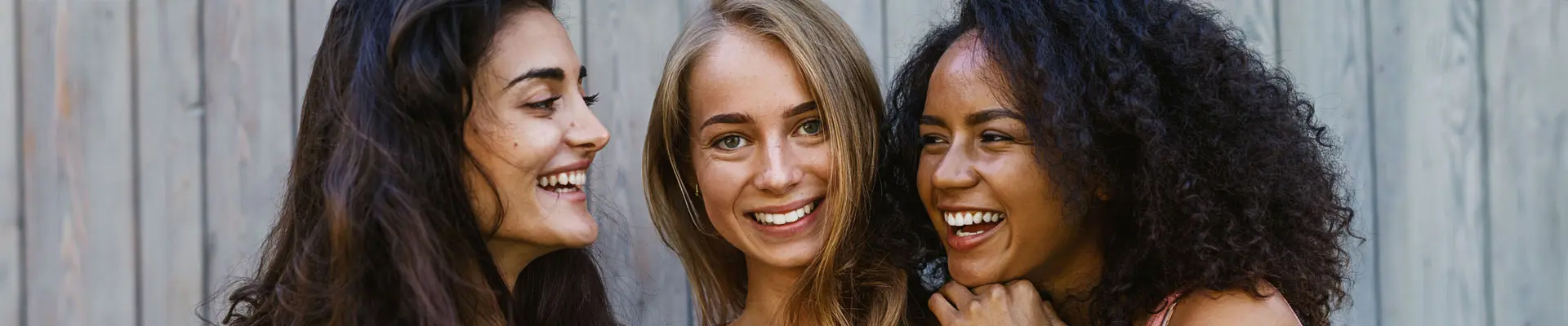 A group of women smiling